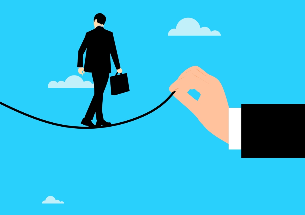 risk-balance-tightrope-business-man-circus-1585797-pxhere.com.jpg